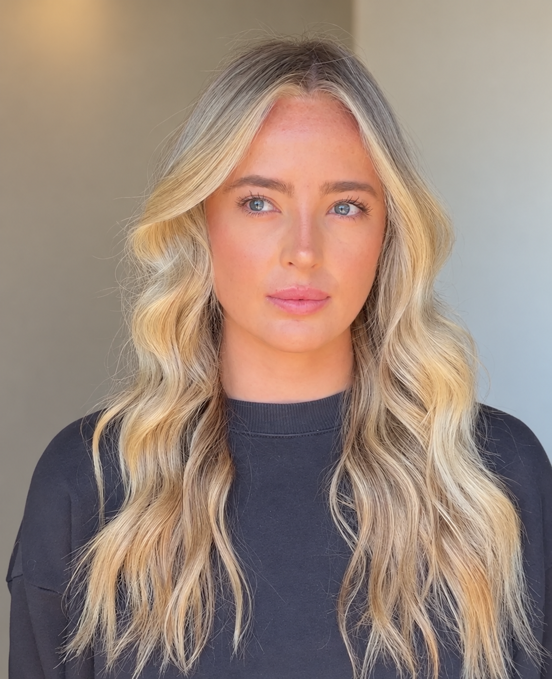 Soft dimensional blonde color created by Hannah